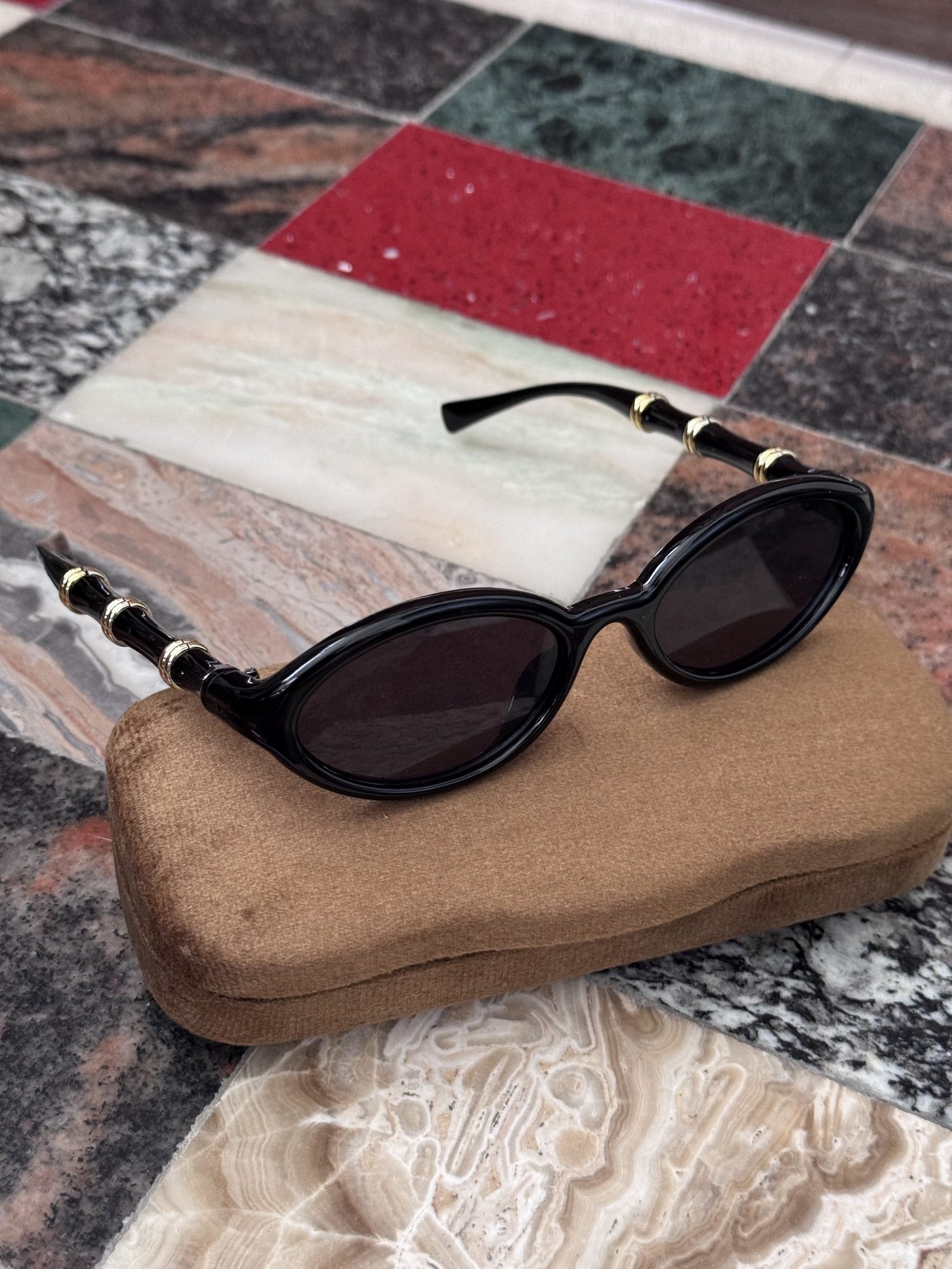 Black sunglasses from Brisc Studio at Nahm