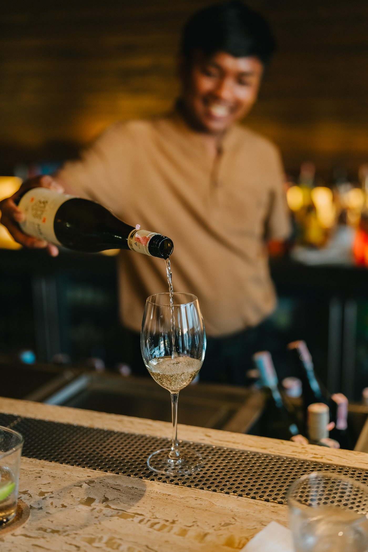 Bartender pouring wine at Soirée, Bangrak, Koh Samui